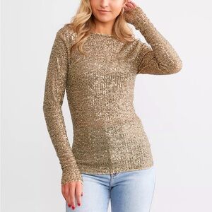 Woman’s Free People Intimately Free People Gold
Rush Sequin Long Sleeve Top. M